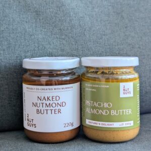 2NutGuys Naked Nutmond Butter jar on the left and Pistachio Almond Butter jar on the right